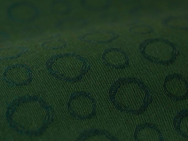 Dark green upholstery fabric